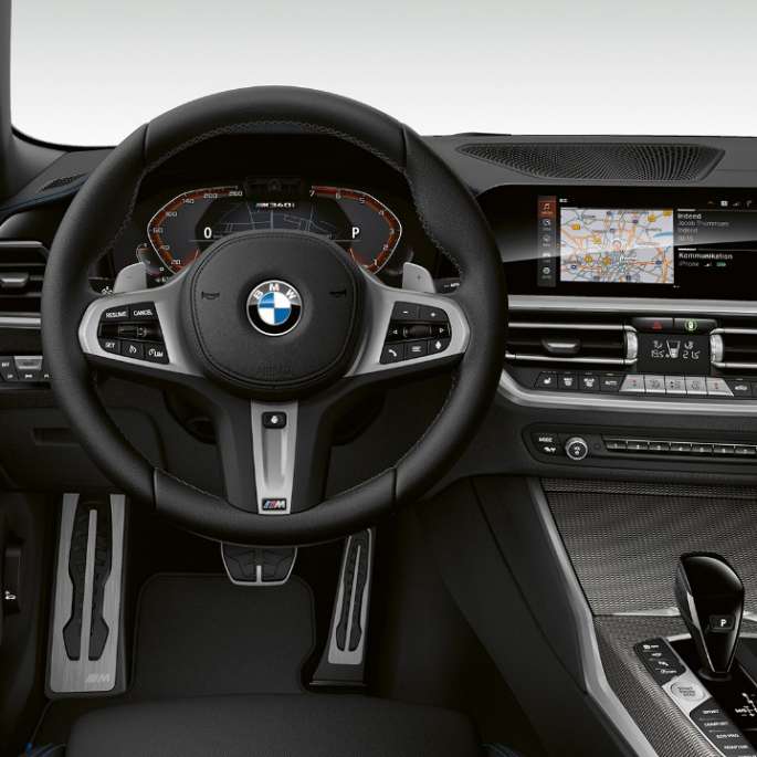 BMW 3 Series Sedan, M340i xDrive Cockpit. Frontal close-up of the driver's cockpit of the BMW 3 Series M340i xDrive Sedan.