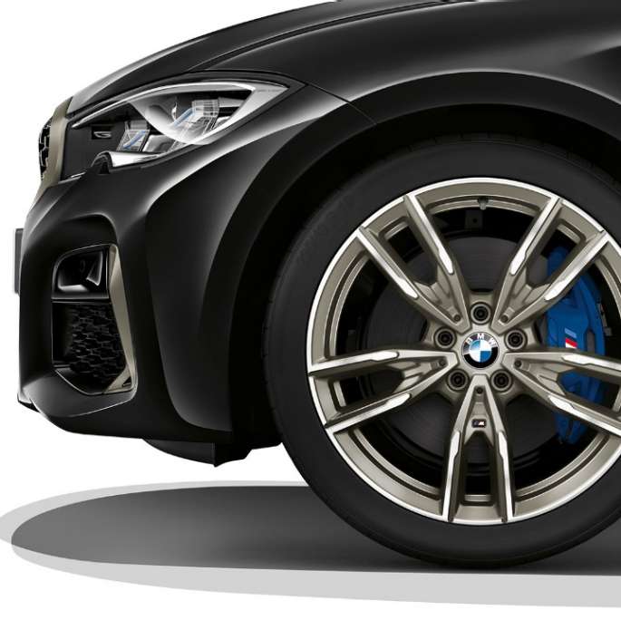 BMW 3 Series Sedan, M340i xDrive light alloy wheel. Close-up of the light alloy wheel of the BMW 3 Series M340i xDrive Sedan.