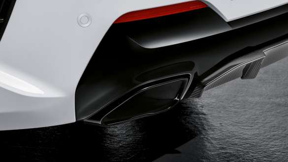 M tailpipe trim in Black high-gloss, left BMW 4 Series Coupé G22 2020 M tailpipe trim in Black high-gloss, left BMW 4 Series Coupé G22 2020 close up