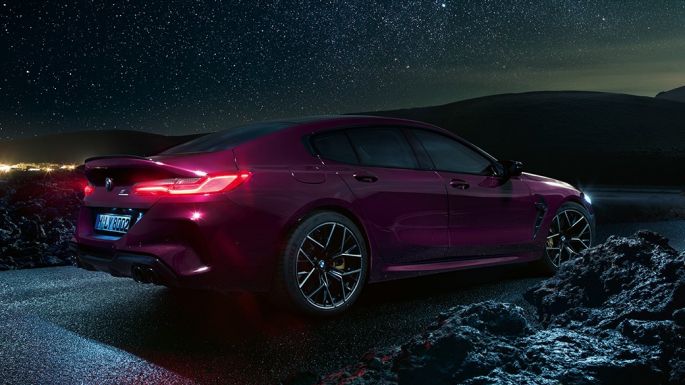 BMW M8 Competition Gran Coupé three-quarter side view from rear F93 BMW M8 Competition Gran Coupé F93 2020 BMW Individual Ametrine metallic three-quarter side view from rear