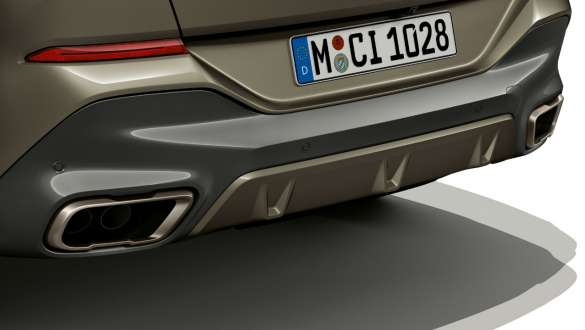 BMW X6 M50i SUV G06 Rear with M sport exhaust system BMW X6 M50i SUV G06 rear with focus on M sport exhaust system