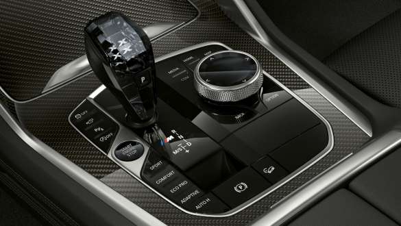 BMW X6 M50i Gear lever with M badge G06 Close-up of the BMW X6 M50i interior Gear lever with M badge G06