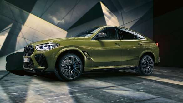 BMW X6 M Competition SUV F96 with M xDrive BMW X6 M Competition with M xDrive BMW Individual Special Paint Urban Green SUV F96 2020 side view