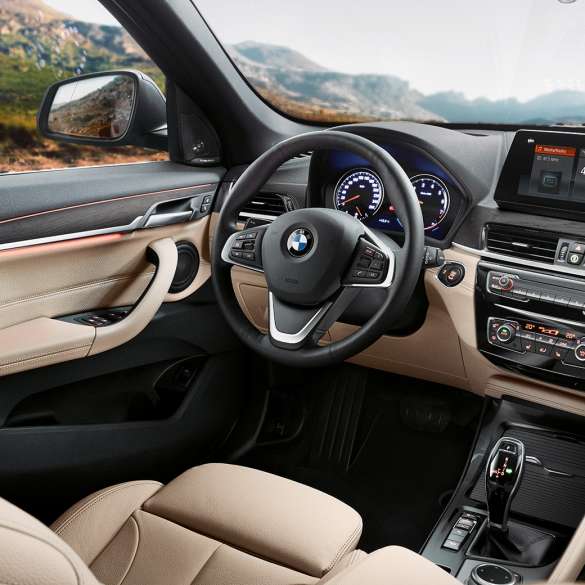 BMW X1 SUV F48 interior, cockpit. BMW X1 SUV F48 interior, view of the 10,25" Control display in the cockpit.