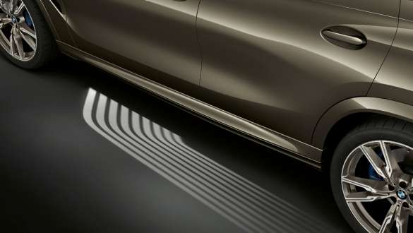 BMW Welcome Light Carpet SUV G06. Side view of the BMW X6 with focus on Welcome Light Carpet SUV G06.