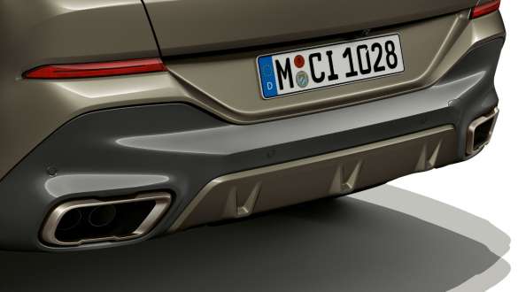 M sport exhaust system oft he BMW X6 SUV G06. Close-up of the M sport exhaust system oft he BMW X6 SUV G06.