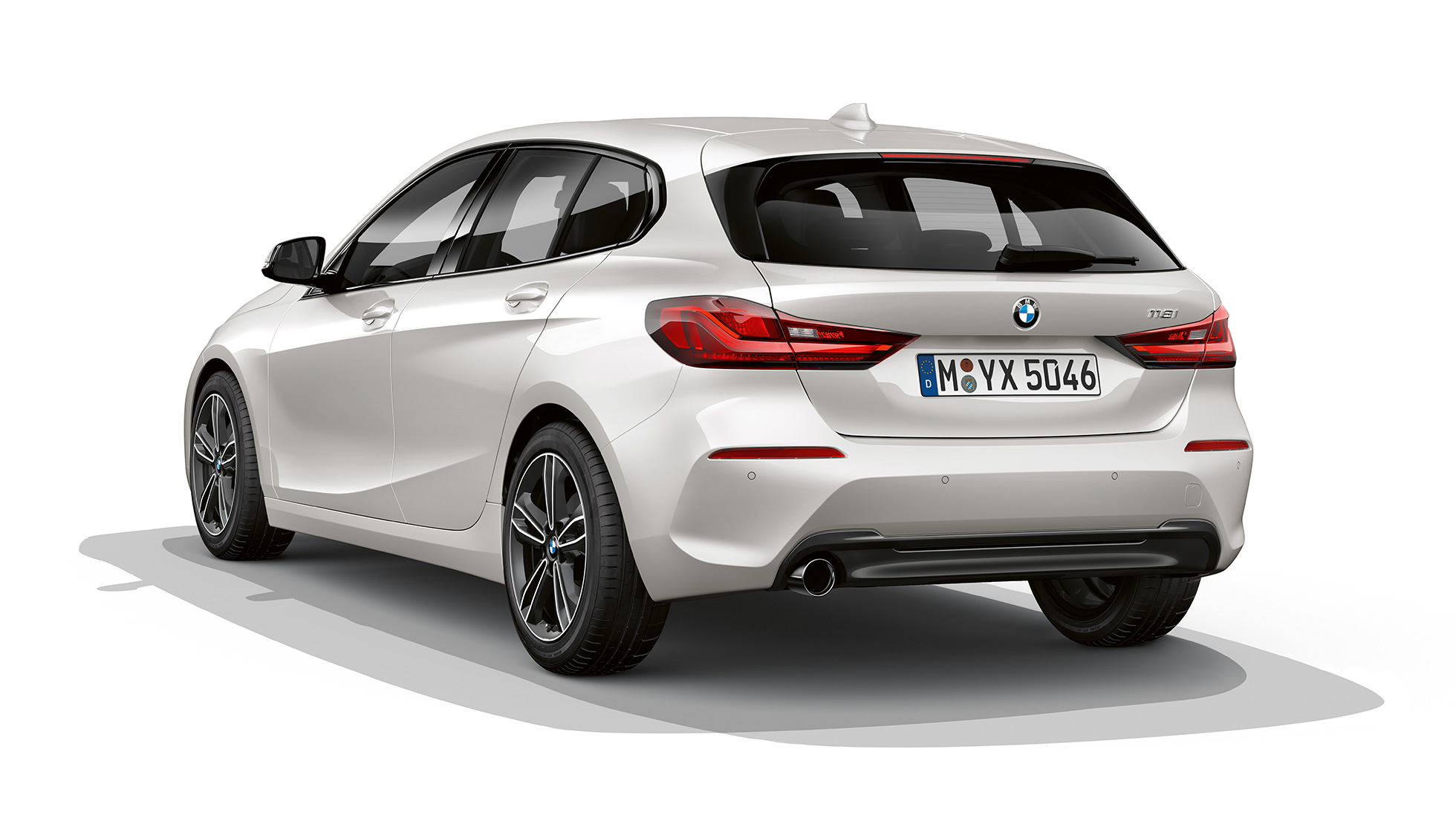 BMW 1 Series Model Sport Line, three-quarter rear F40. BMW 1 Series Model Sport Line in Mineral White metallic, studio shot three-quarter rear F40.