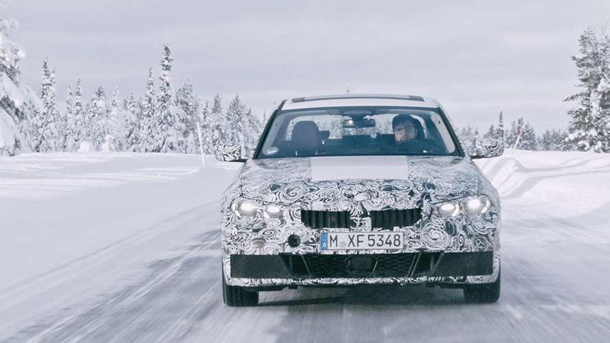 BMW 3 Series in action. Disguised prototype of the BMW 3 on snow in the wilds.