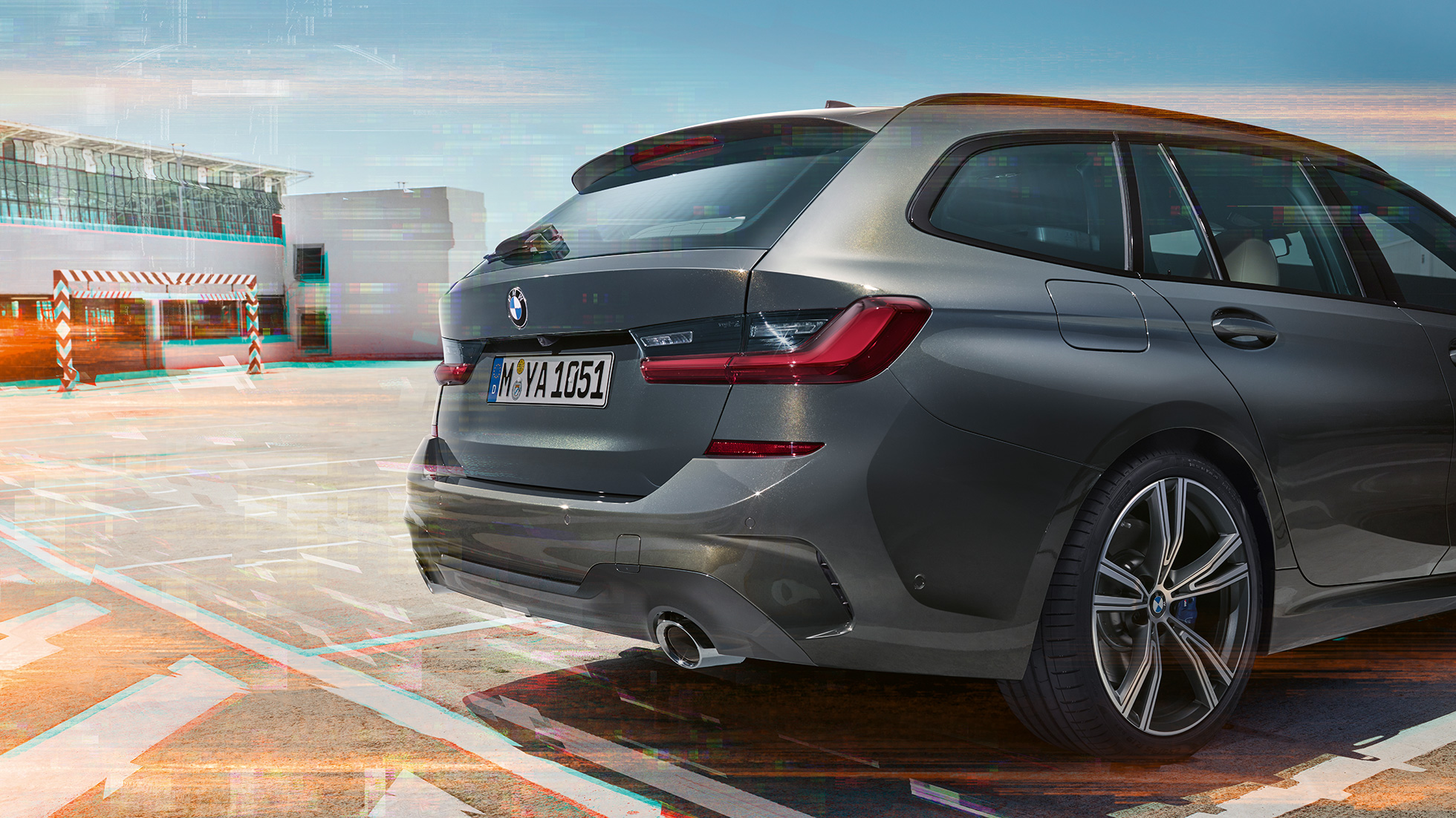 BMW 3 Series Touring, three-quarter rear view on parking lot G21 BMW 3 Series Touring, three-quarter rear view on parking lot in urban environment G21