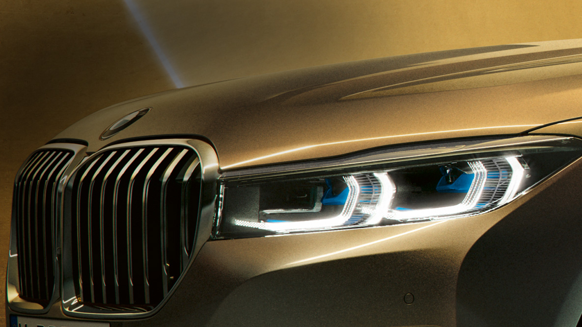 BMW 7 Series Sedan laserlight 플러그인 하이브리드 G11 BMW 7 Series Sedan: close-up of laserlight with blue-white beams 플러그인 하이브리드 G11