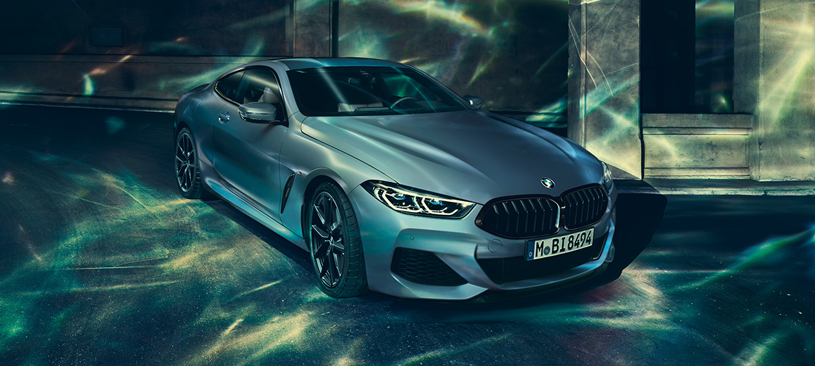 The BMW M850i Coupé First Edition, three-quarters front A three-quarter front still shot of the BMW M850i Coupé First Edition in an urban setting.