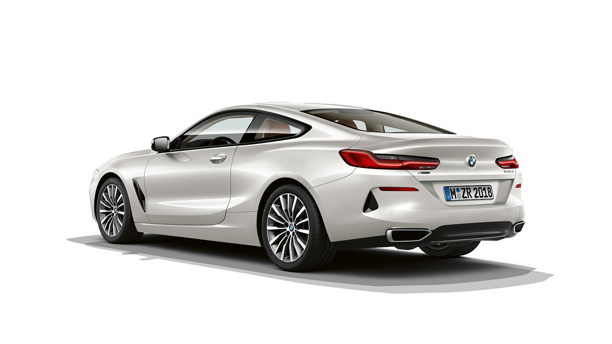 BMW 8 Series Coupé, three-quarter back view G15. BMW 8 Series Coupé, Mineral White metallic, three-quarter back view G15.
