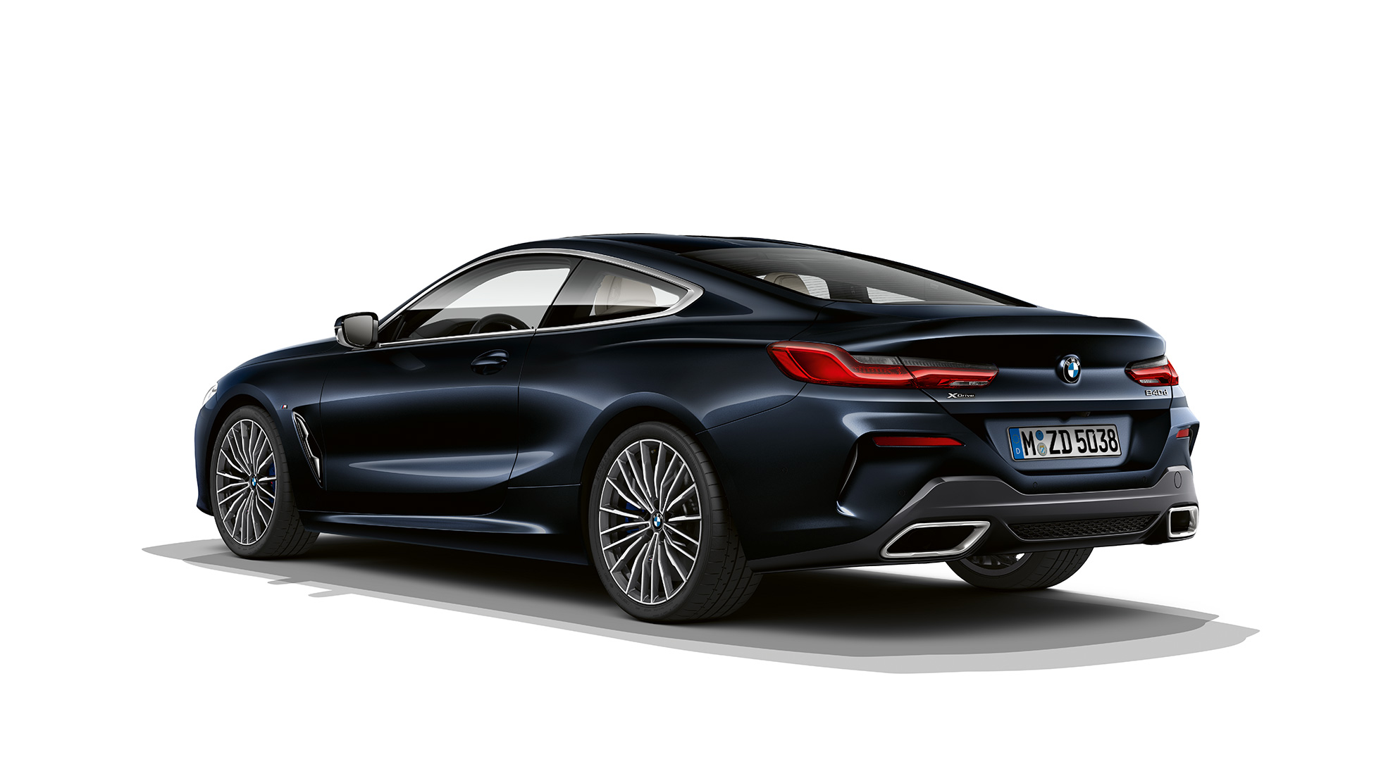 BMW 8 Series Coupé, three-quarter back view G15. BMW 8 Series Coupé, Carbon Black metallic, three-quarter back view G15.