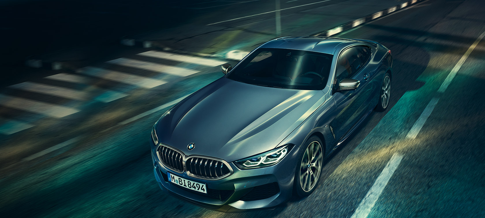 BMW 8 Series Coupé, three-quarter front view G15. BMW 8 Series Coupé, three-quarter front view, standing with view on engine bonnet G15.