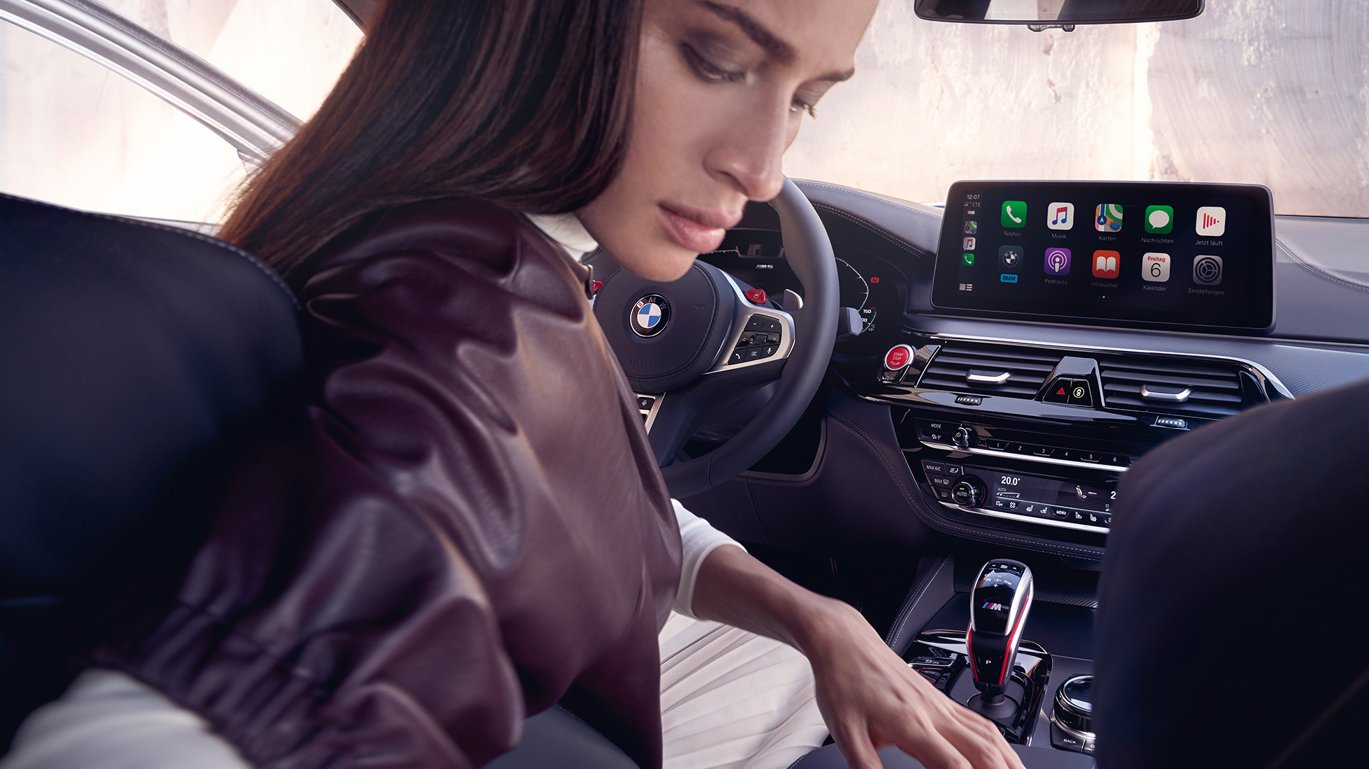 BMW M5 Competition F90 LCI Facelift 2020 cockpit BMW M5 Competition F90 LCI Facelift 2020 interior cockpit woman in the driver’s seat