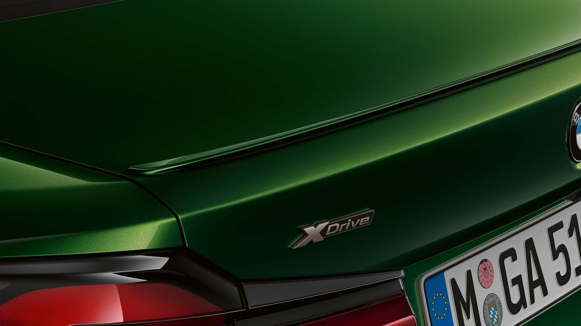 Rear spoiler BMW M550i xDrive Sedan G30 LCI Facelift 2020 close-up rear Rear spoiler BMW M550i xDrive Sedan G30 LCI Facelift 2020 BMW Individual Verde Ermes metallic close-up rear