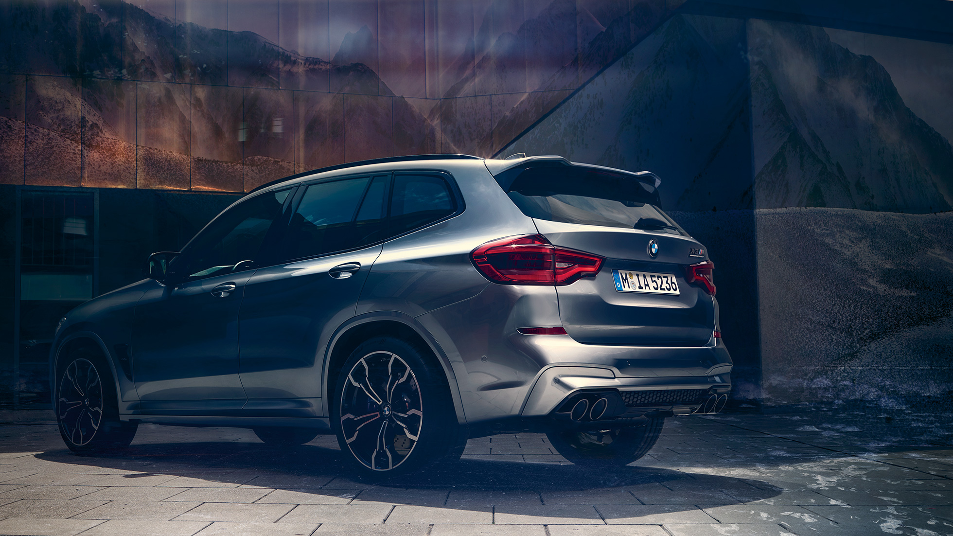 BMW X3 M Competition SUV, lateral rear view F97. BMW X3 M Competition SUV in Donington Grey metallic, exterior, lateral rear view F97.