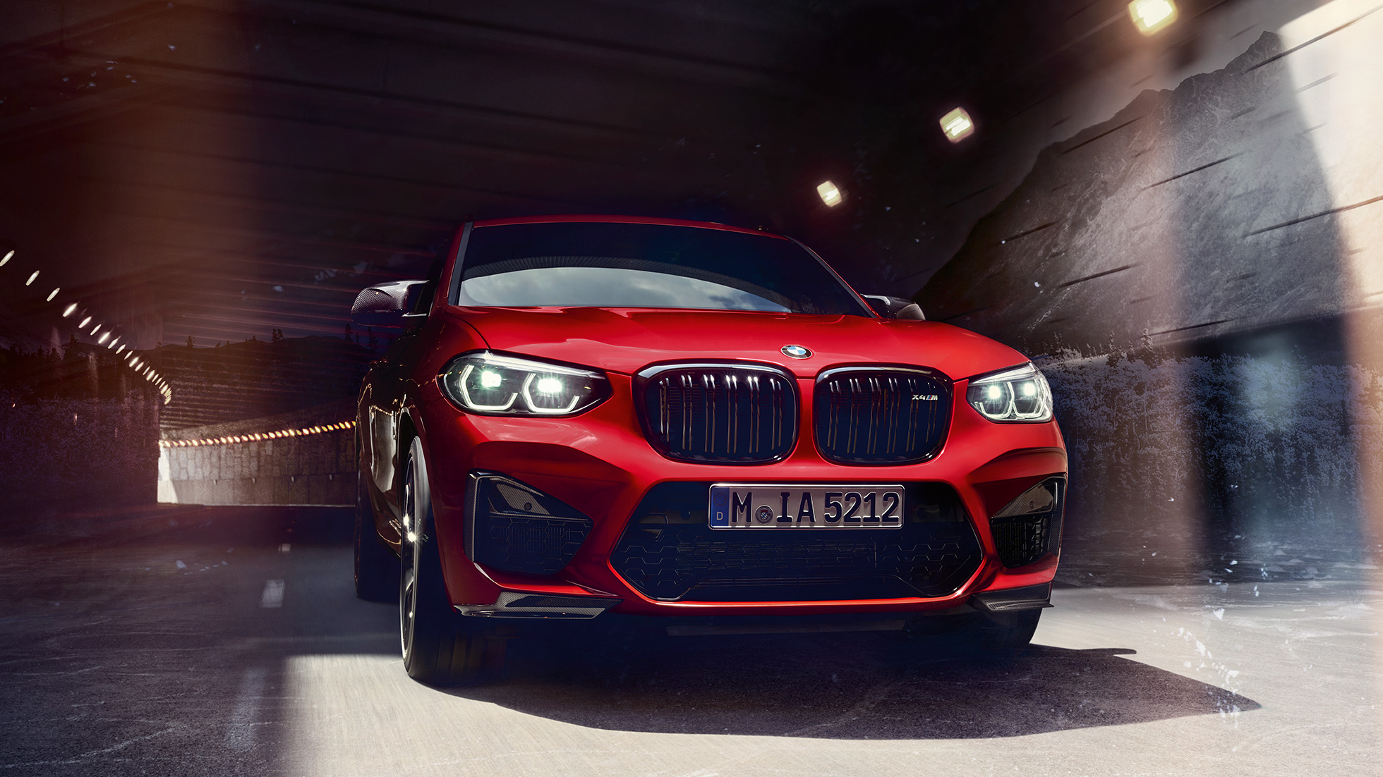 BMW X4 M Competition SUV, front view F98. BMW X4 M Competition SUV in Toronto Red metallic, exterior, front view F98.