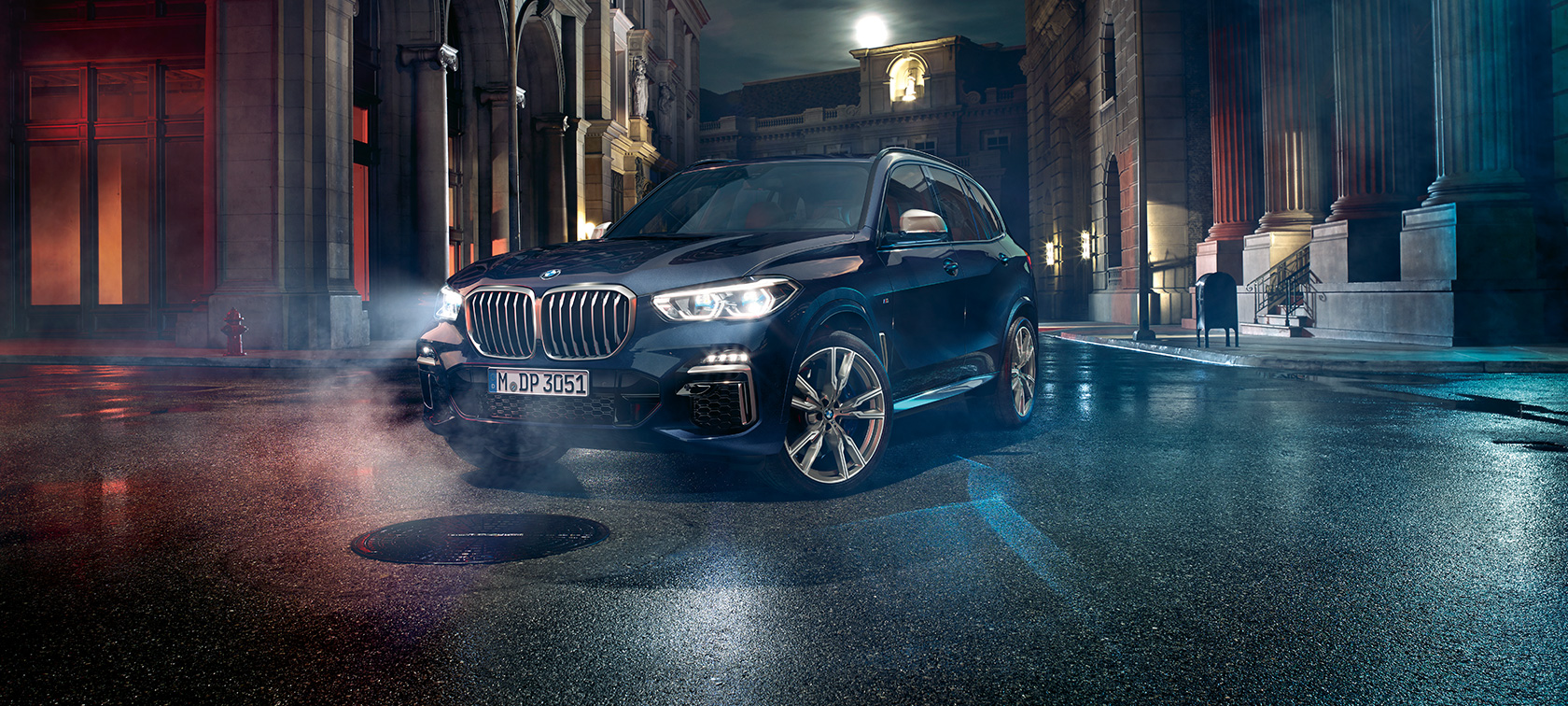 BMW X5 M50i and M50d SUV G05 three-quarter front view BMW X5 M50i and M50d SUV G05 Carbon black metallic three-quarter front view