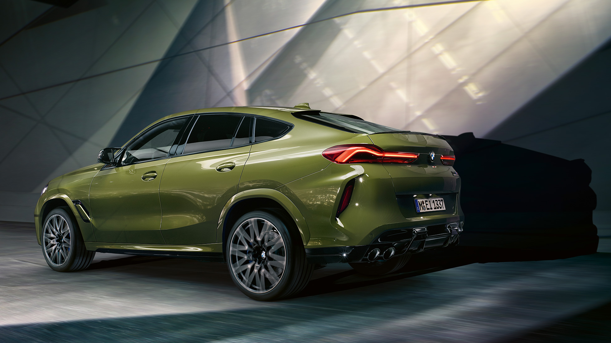 BMW X6 M Competition SUV F96 with M xDrive BMW X6 M Competition with M xDrive F96 2020 BMW Individual Special Paint Urban Green SUV three-quarter rear view