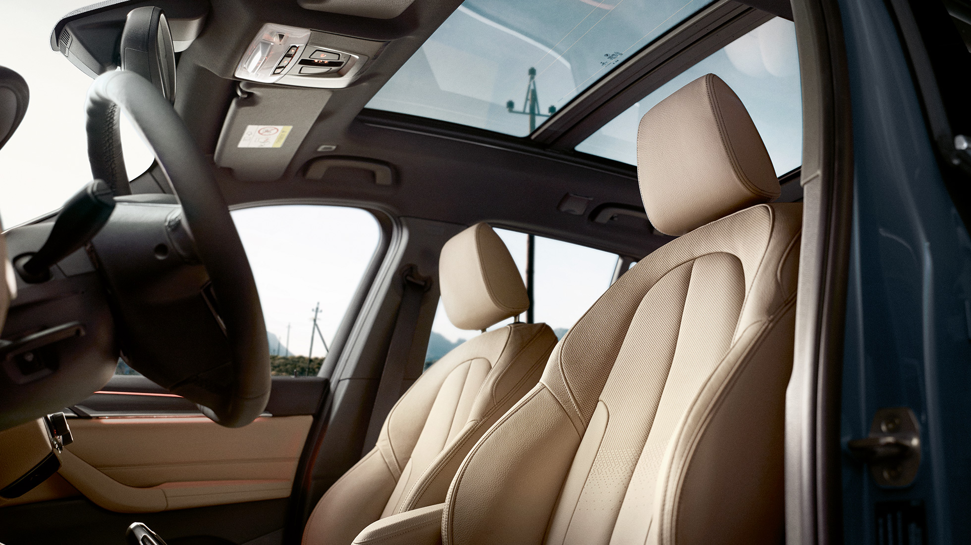 BMW X1 SUV F48 interior, sport seats. BMW X1 SUV F48 interior, view of ergonomic sport seats.