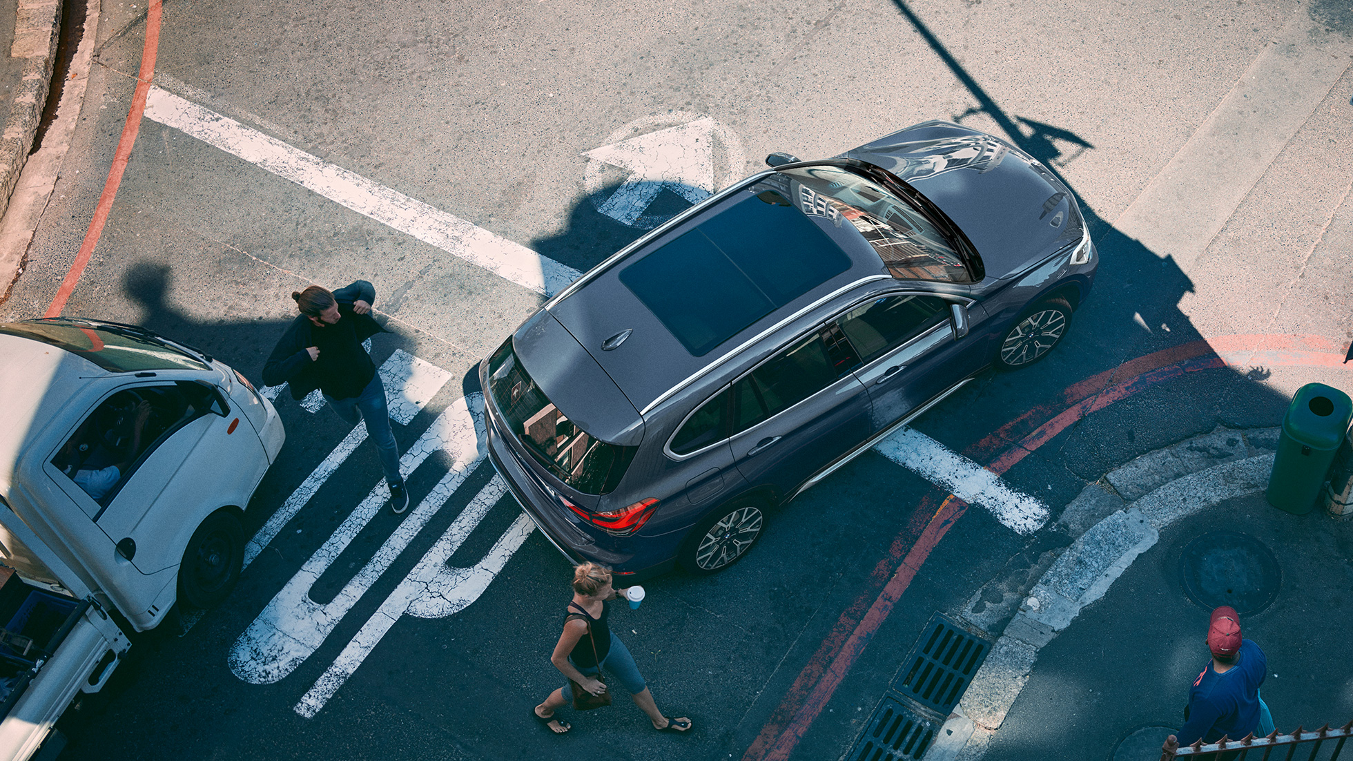BMW X1 SUV F48, Panorama glass roof. BMW X1 SUV F48, with view of the panorama glas roof from an aerial perspective.
