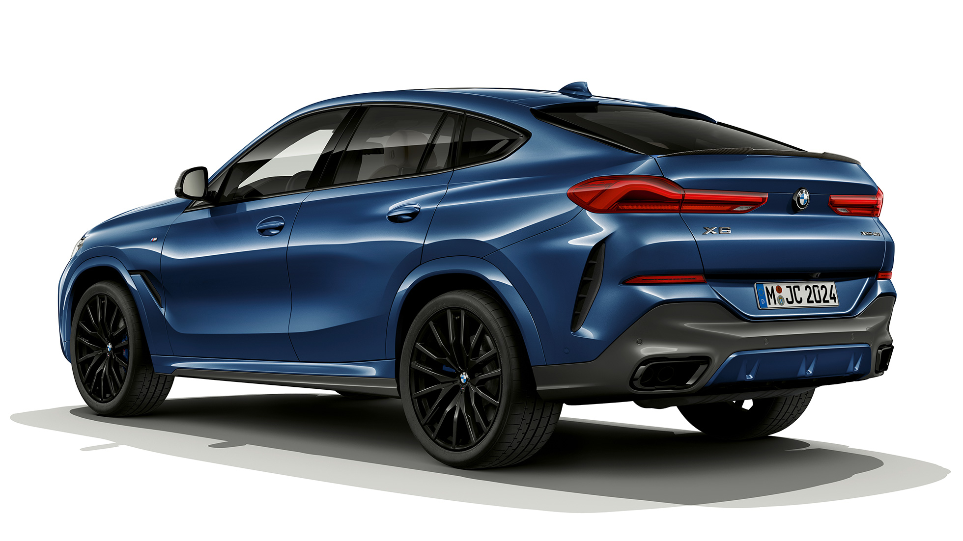 BMW X6 with M Sport package, rear SUV G06. BMW X6 with M Sport package in three-quarter rear perspective SUV G06.