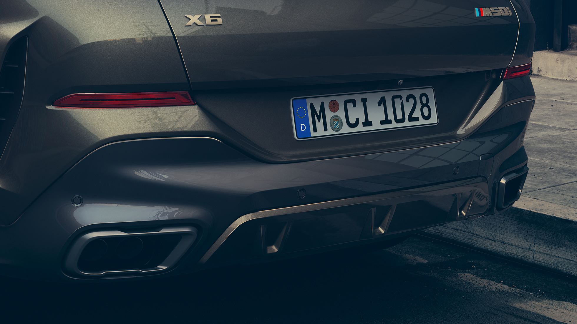 M sport exhaust system oft he BMW X6 SUV G06. Close-up of the M sport exhaust system oft he BMW X6 SUV G06.