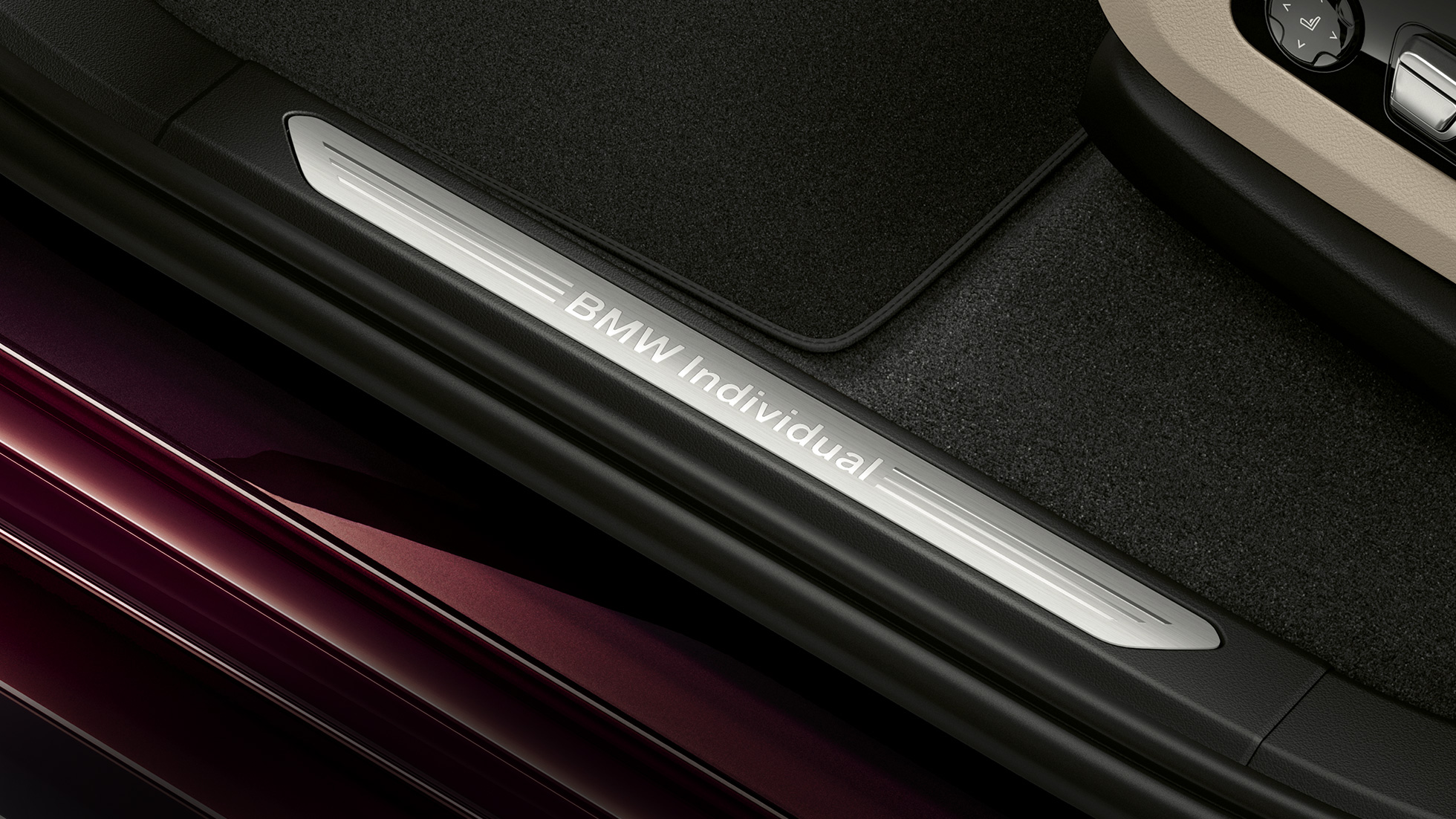 Entry sills with BMW individual lettering SUV G07 Close-up of illuminated entry sills with BMW individual lettering SUV G07