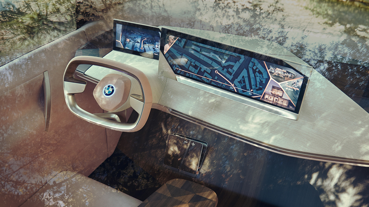 BMW 비전 iNEXT의 운전자 공간 BMW 비전 iNEXT 운전석의 스티어링 휠과 대시보드