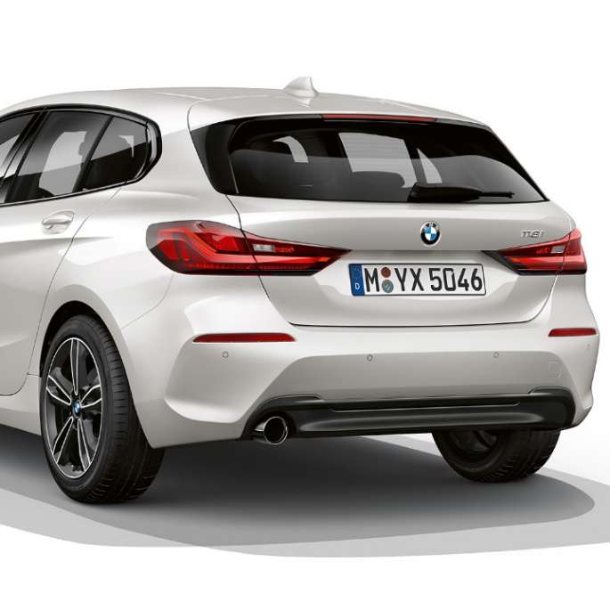 BMW 1 Series Model Sport Line in Mineral White metallic, studio shot three-quarter rear F40.