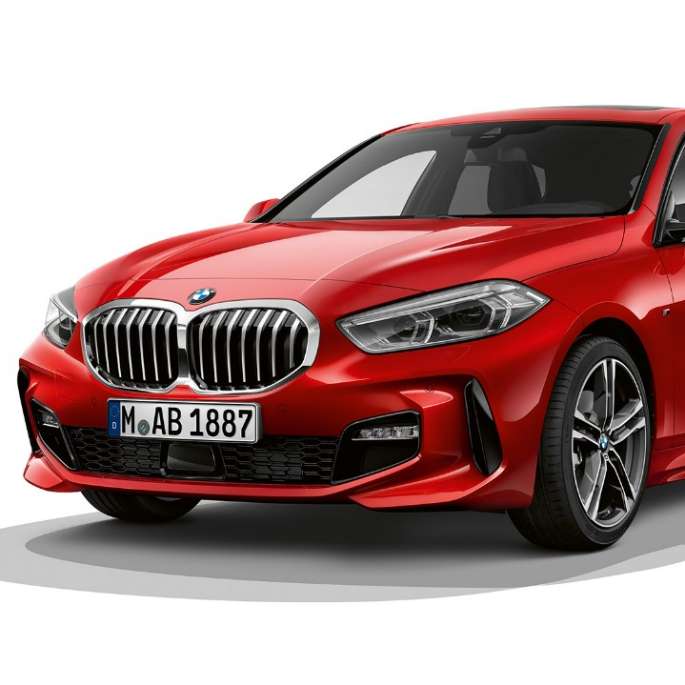 BMW 1 Series Model M Sport in Melbourne Red metallic, studio shot three-quarter front F40.