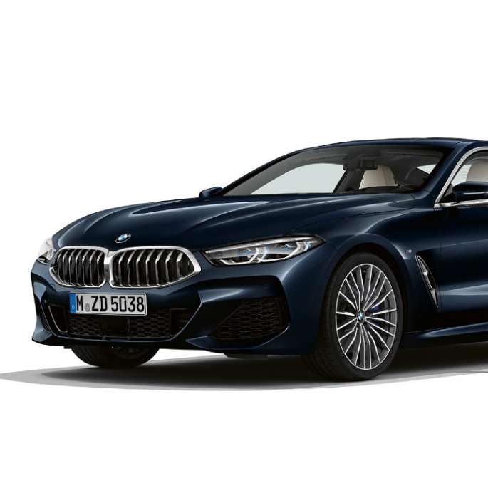 BMW 8 Series Coupé, Carbon Black metallic, three-quarter front view G15.